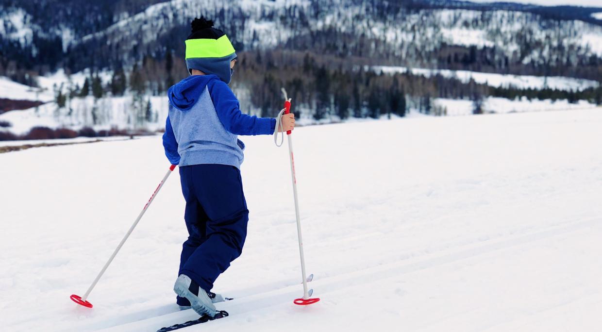 Kid XC Skiing During a Yellowstone Tour